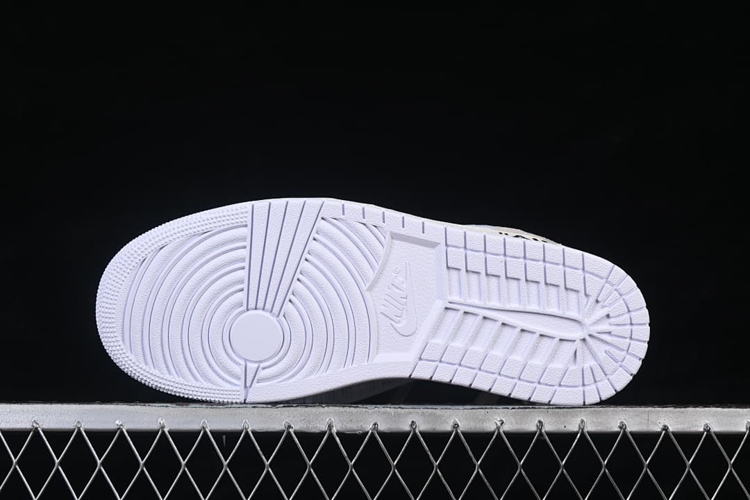 Underside view of the white outsole tread