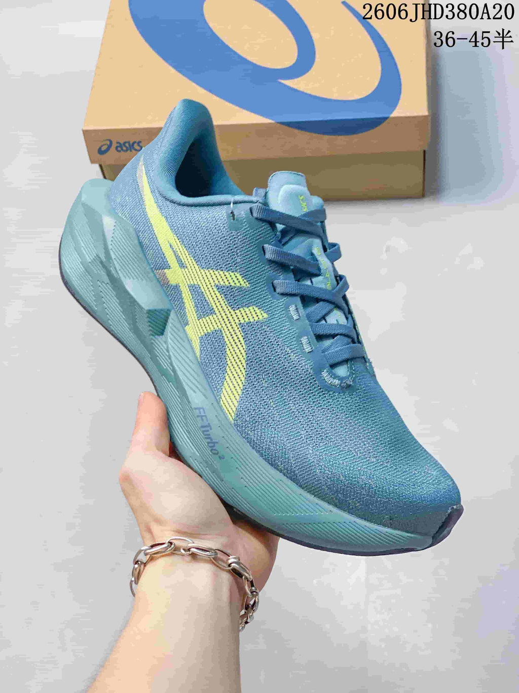 Side view of the blue ASICS Novablast 6 running shoe