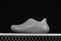 Side view of a grey Nike ReactX Rejuven8 clog sandal