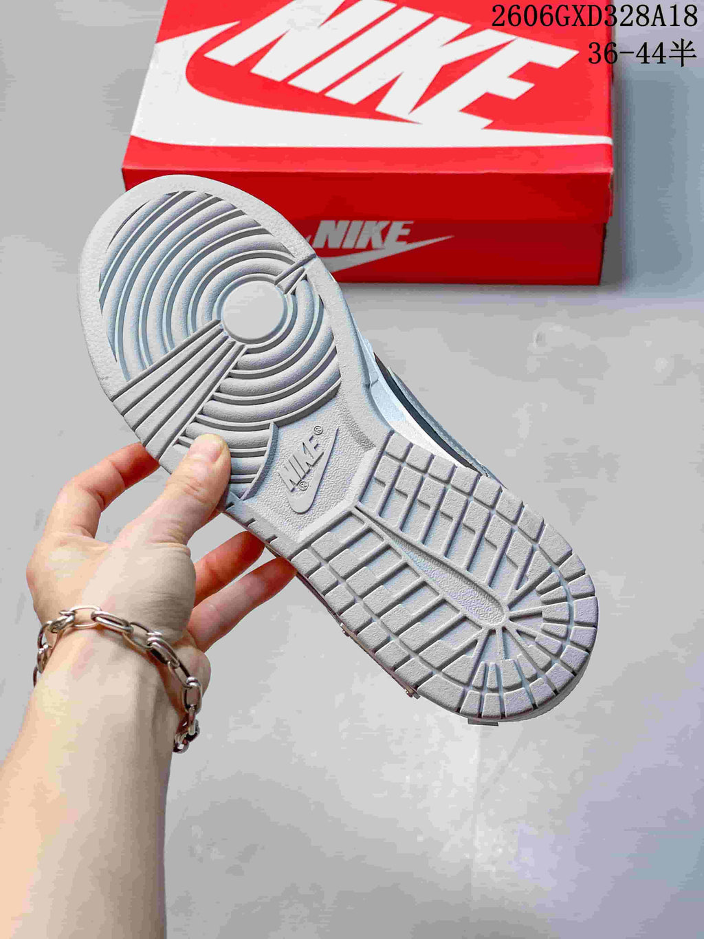 Close-up of the sneaker outsole showing a patterned tread