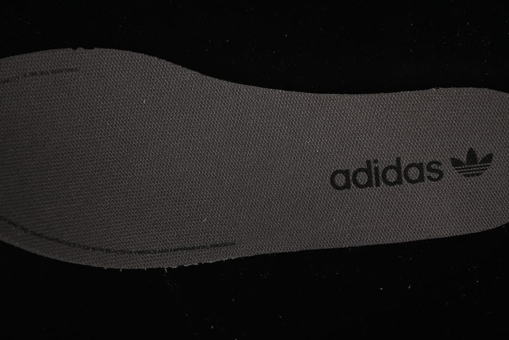 Close-up of an adidas-branded insole.