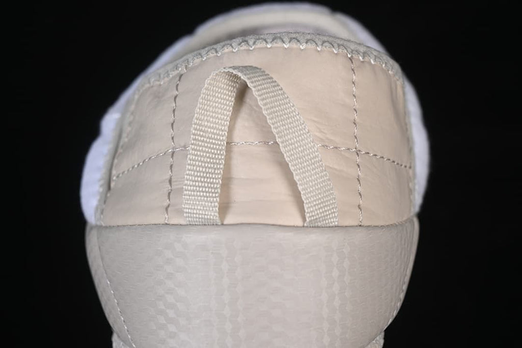 Rear view showing the heel panel and pull loop