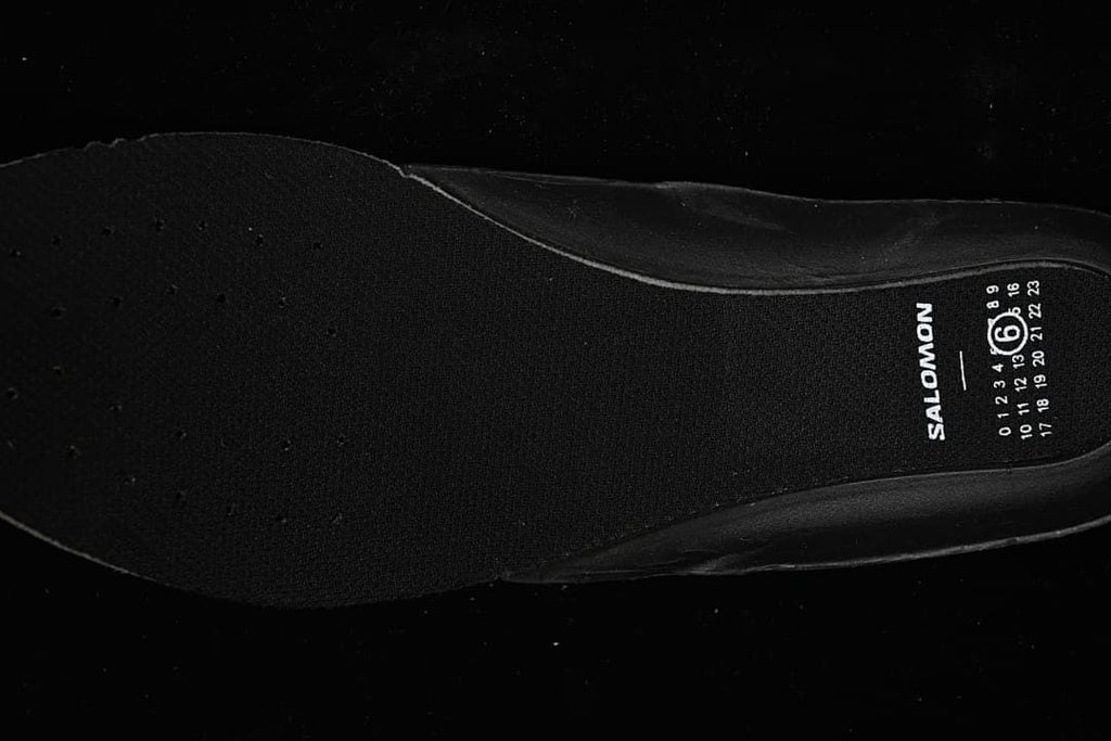 Salomon branding and size markings on the insole