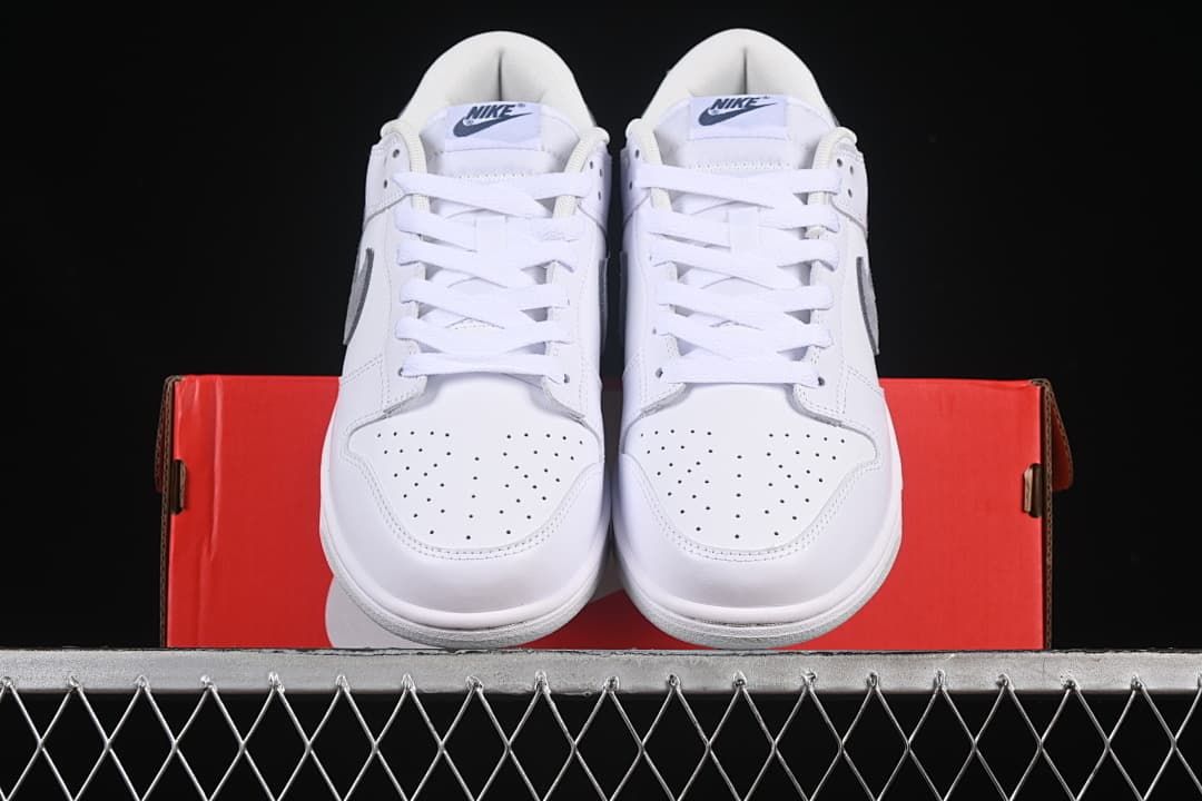 Front view of the pair with perforated toe boxes and white laces