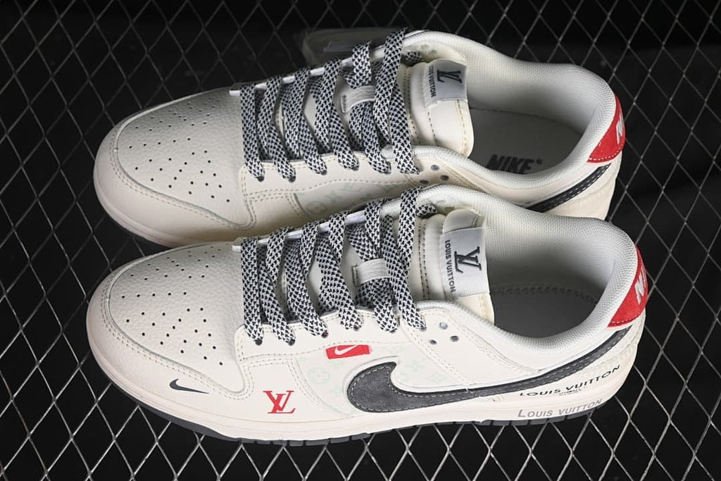 Top view of cream low-top sneakers with patterned laces, perforated toe boxes, and visible Nike and Louis Vuitton branding.