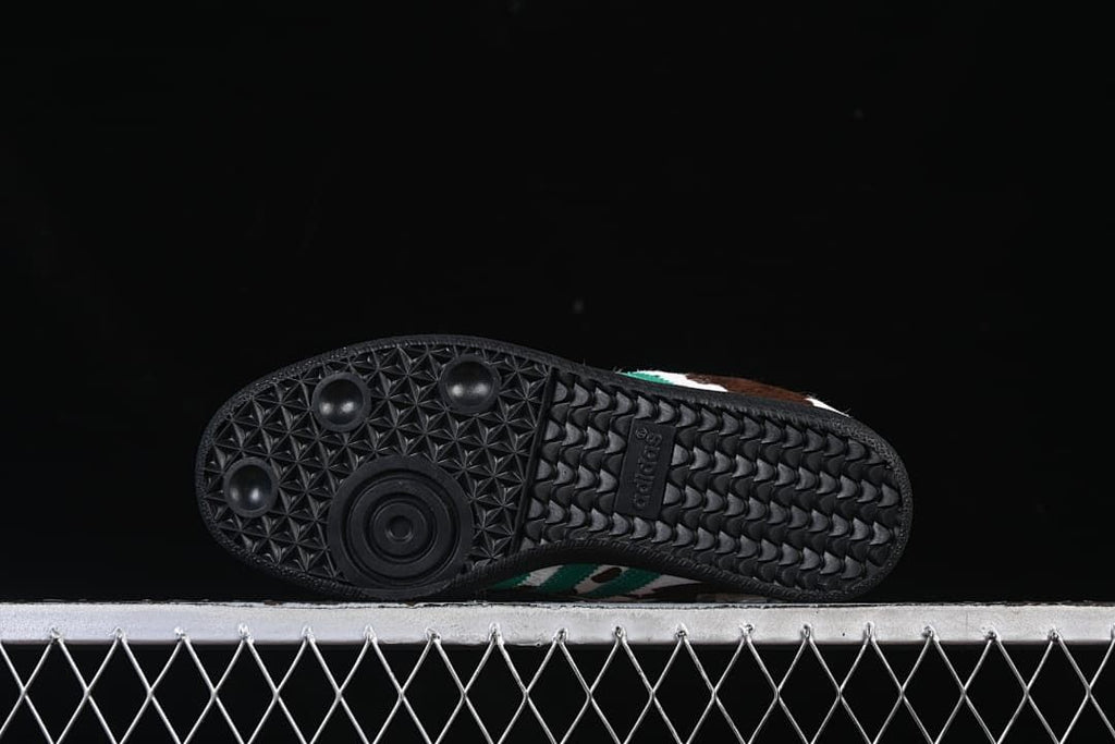 Underside view showing the black patterned rubber outsole
