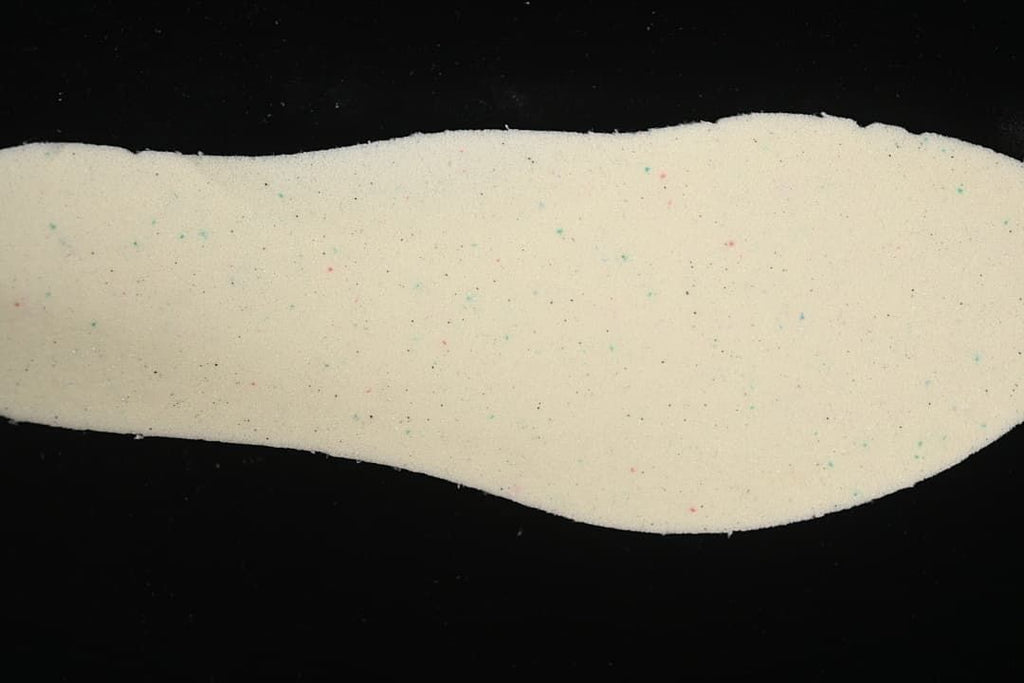 Light-colored shoe insole shown from above.