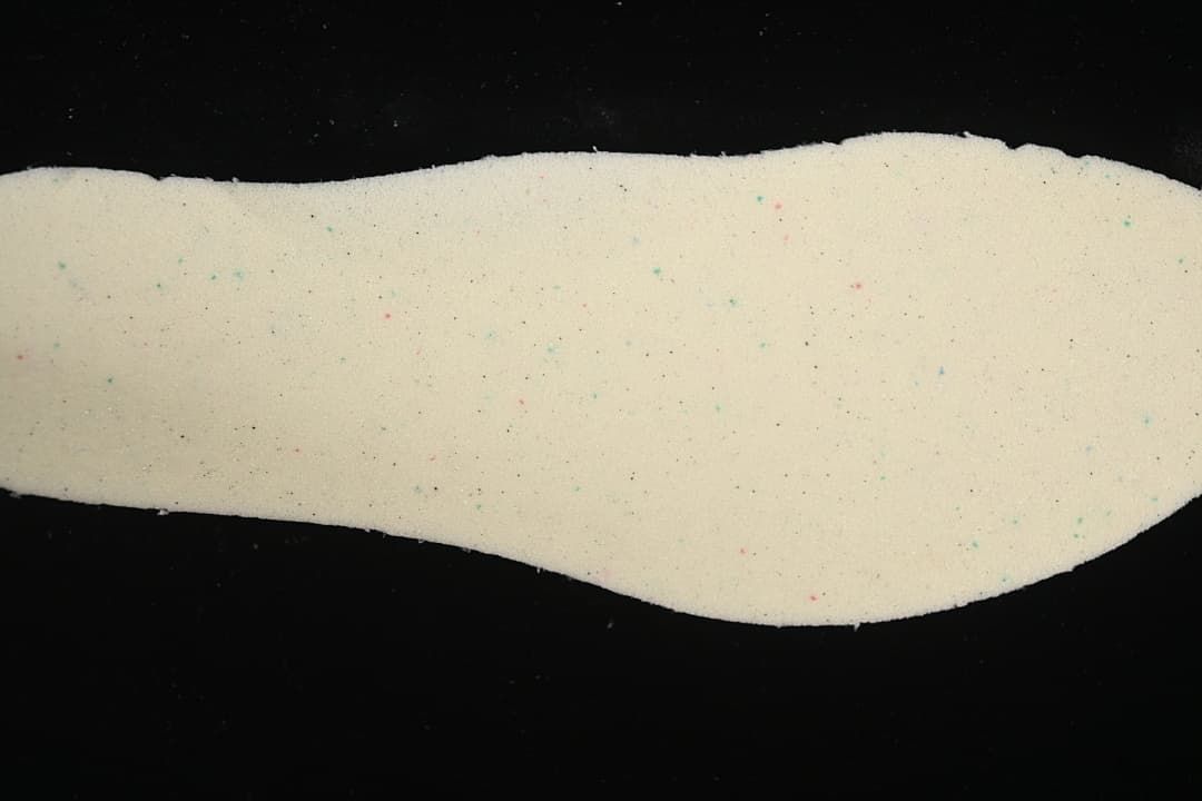 Light-colored shoe insole shown from above.