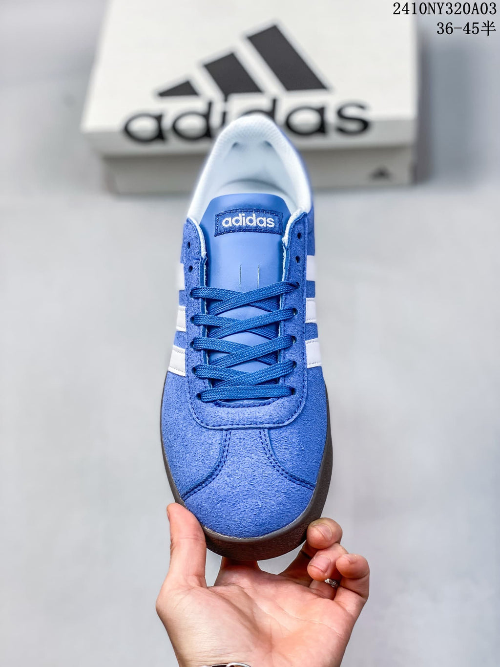 Top view of the blue sneaker showing its laces and toe panel