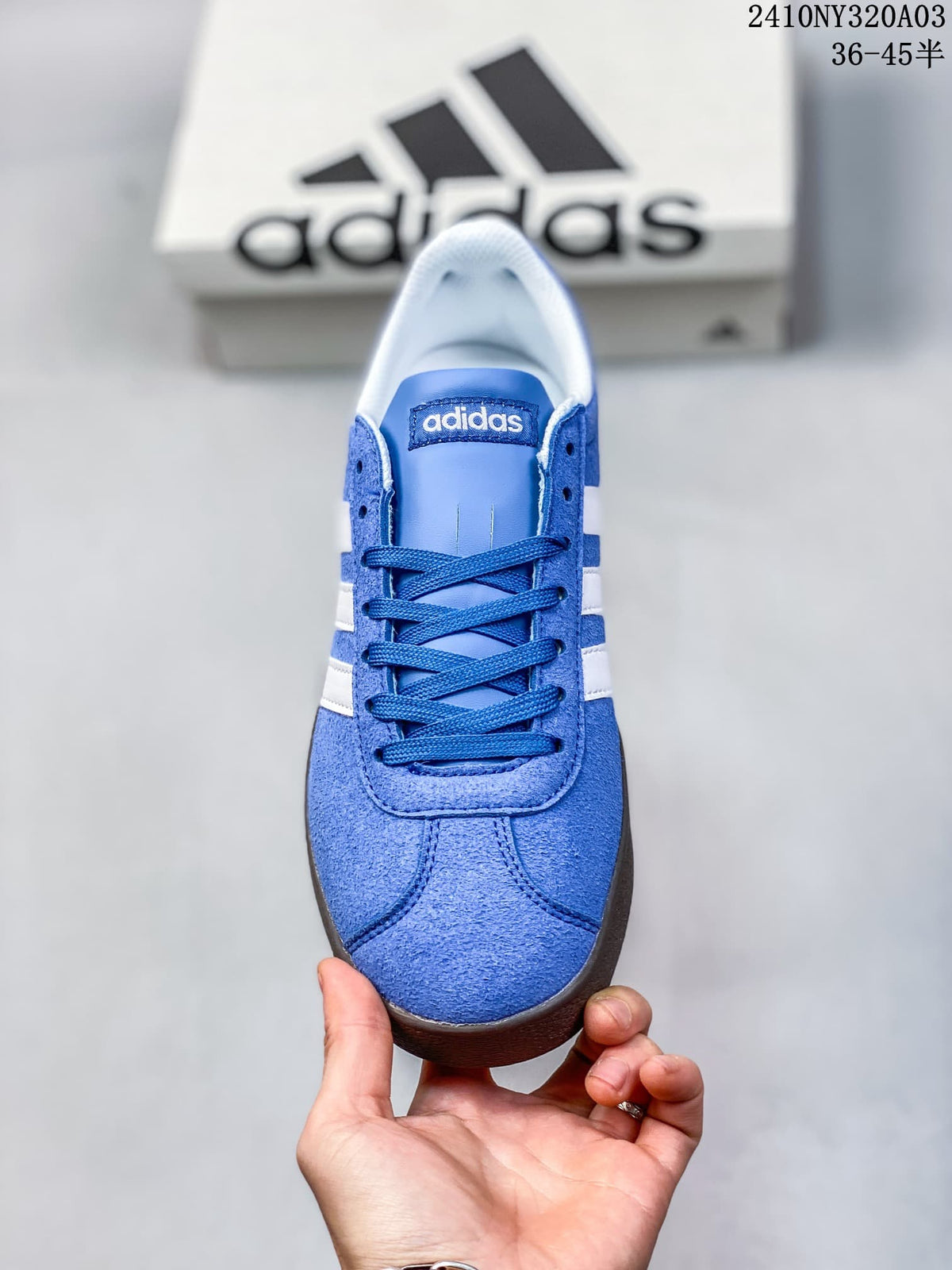 Top view of the blue sneaker showing its laces and toe panel