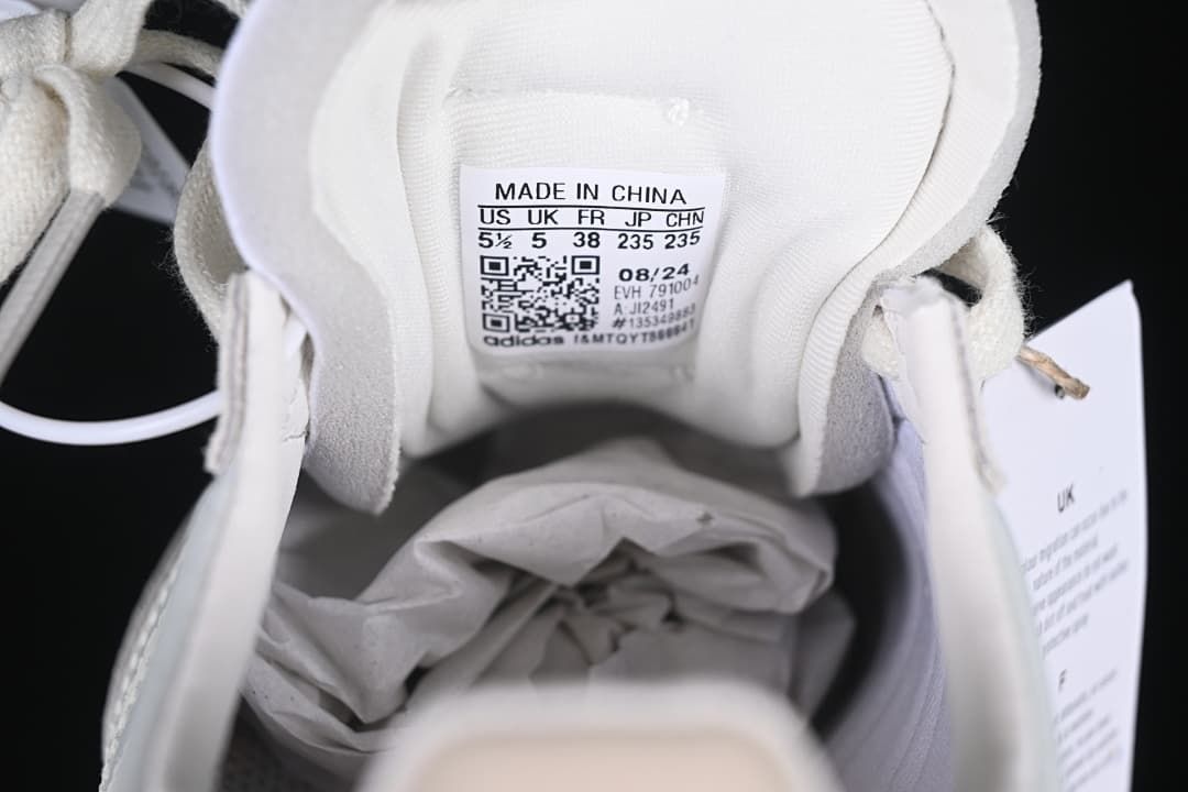 Shoe tongue size label showing EU 38 and model code JI2491