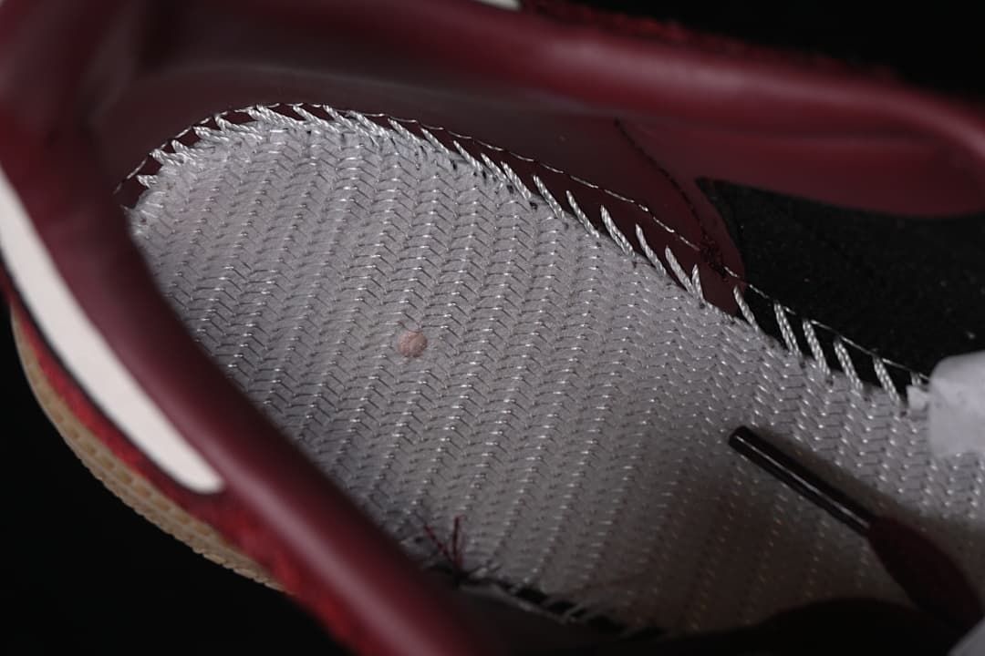 Close-up inside the sneaker showing a patterned footbed