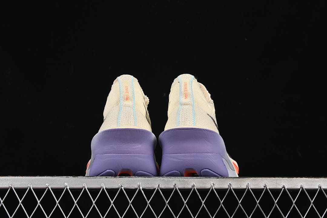 Rear view of the pair showing purple heel sections