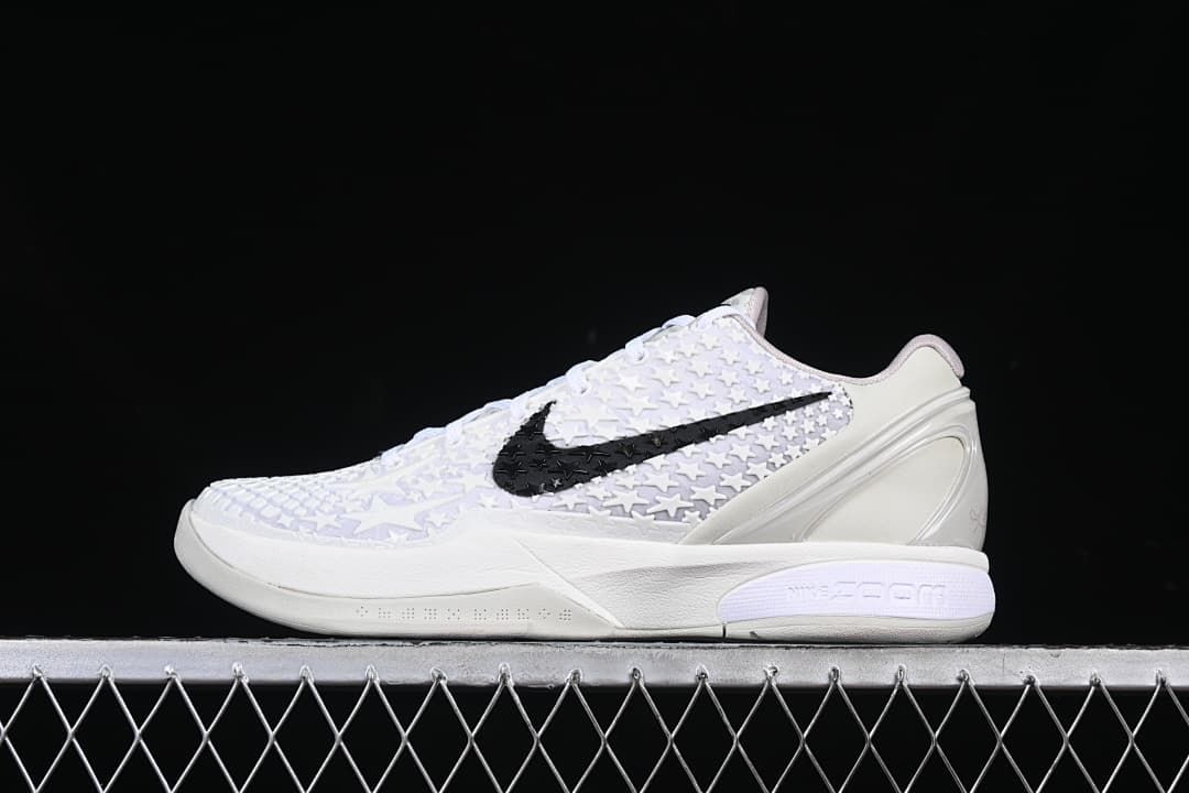 Side view of white Nike Kobe VI Protro basketball shoe with black Swoosh