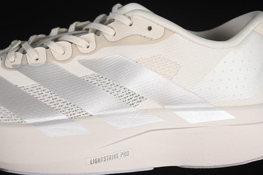Close-up of the side stripes, upper and Lightstrike Pro midsole marking