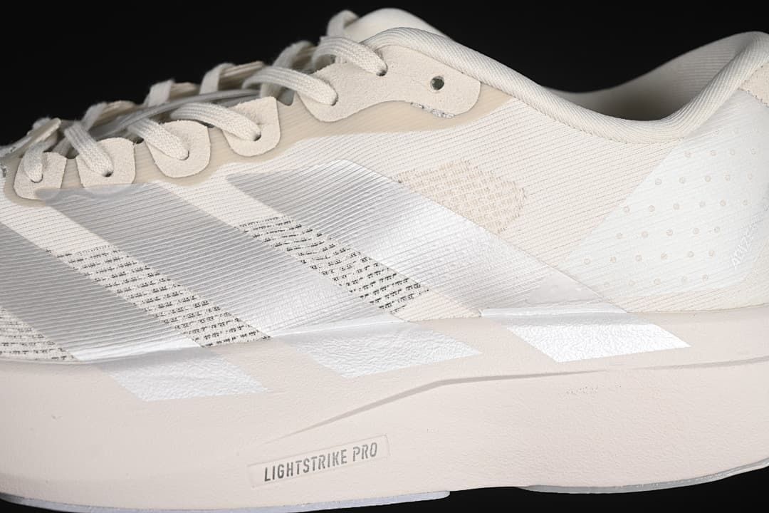 Close-up of the side stripes, upper and Lightstrike Pro midsole marking