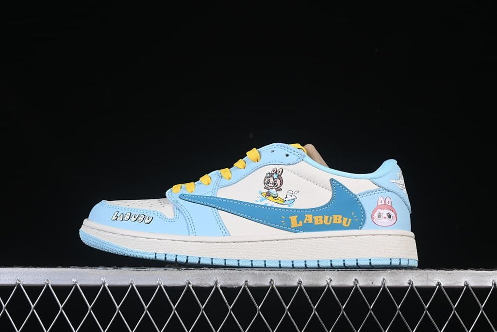Side view of a light blue and white low-top sneaker with yellow laces and Labubu graphics
