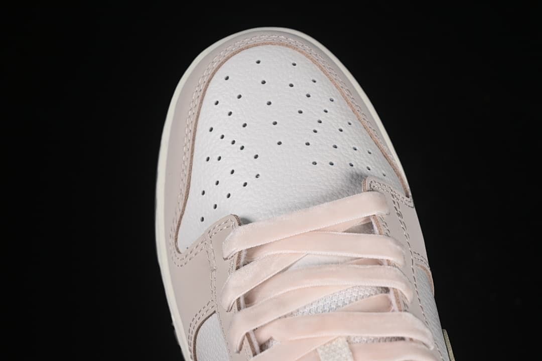Top view of the perforated toe and laces