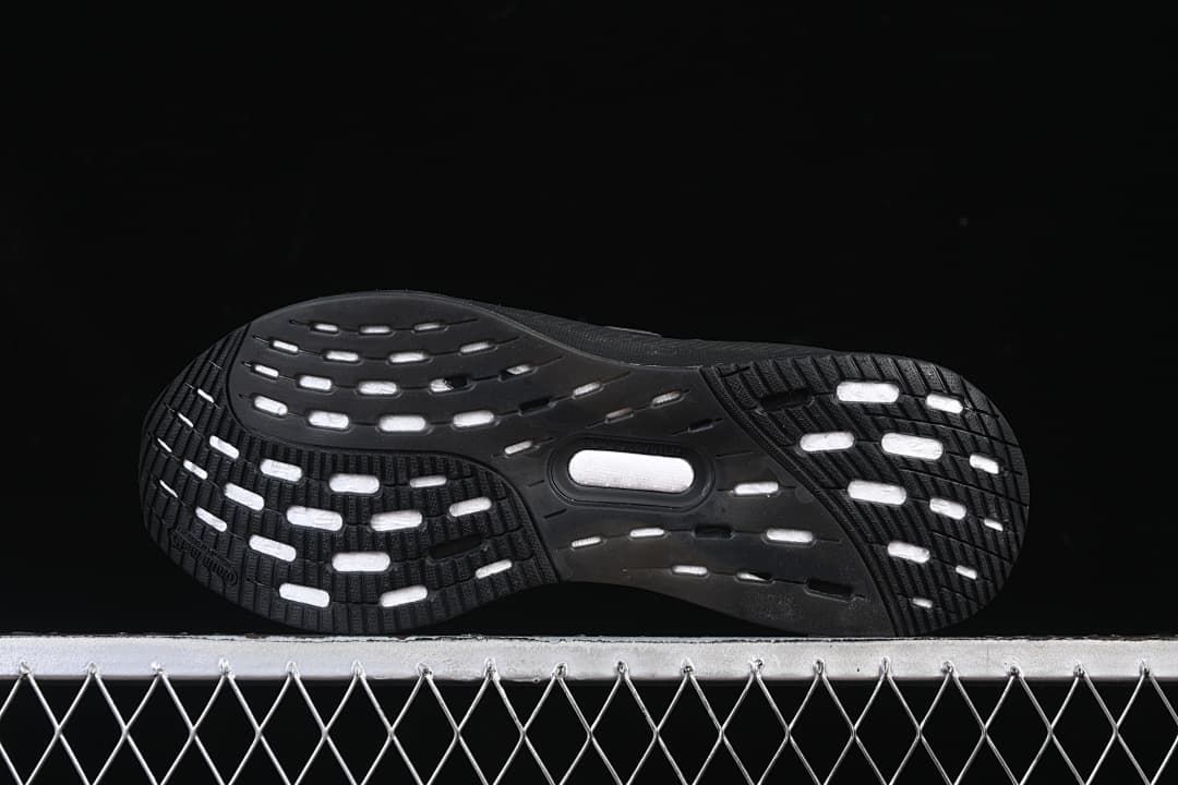 Underside showing the patterned black outsole.