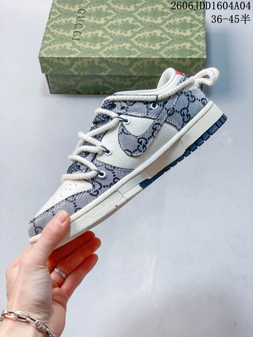 Side profile showing cream overlays, patterned panels, and thick white laces