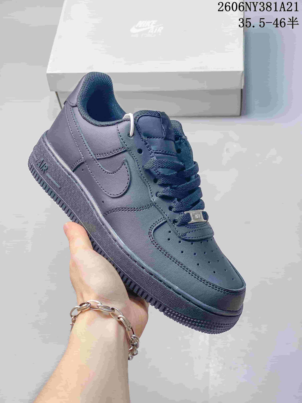 Side view of a dark navy Nike Air Force 1 low-top sneaker
