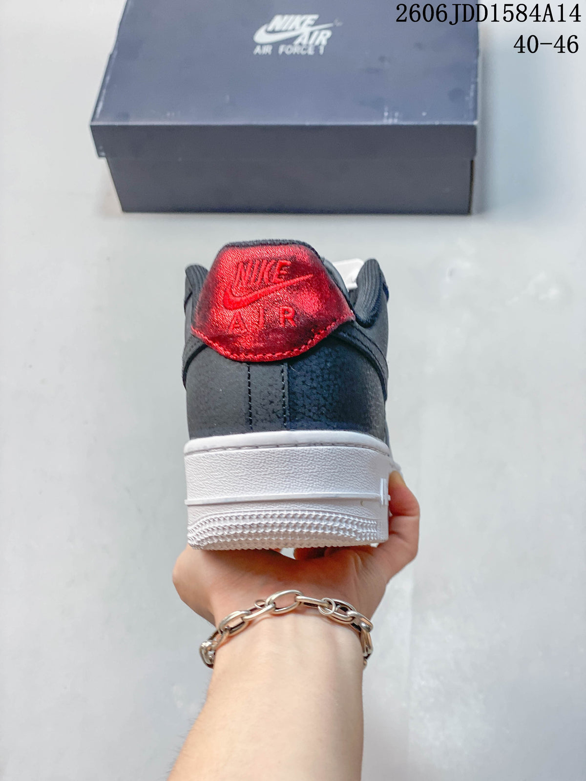 Rear view of the sneaker with a red heel detail and white outsole