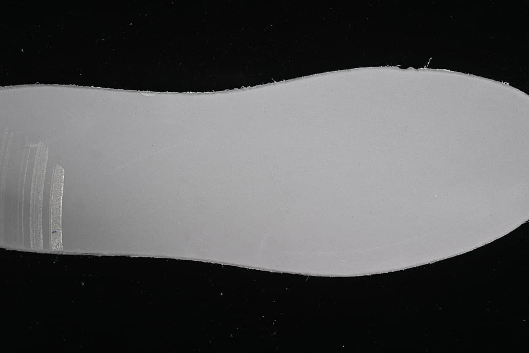 Close-up of the light-colored outsole