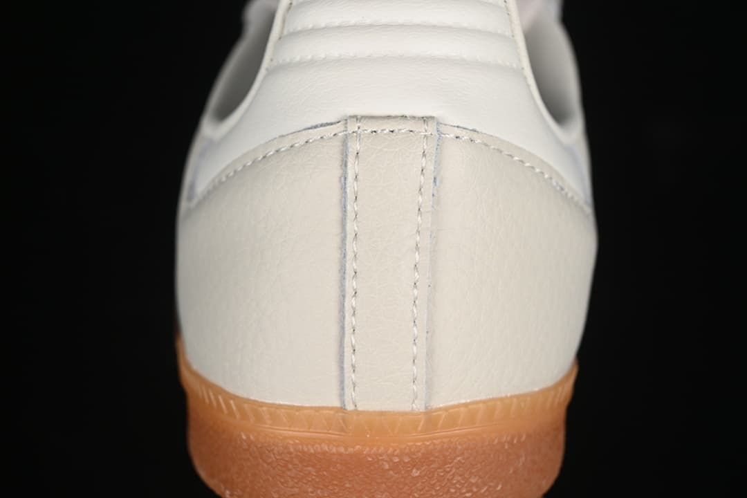 Rear view highlighting the heel panel, stitching and gum outsole