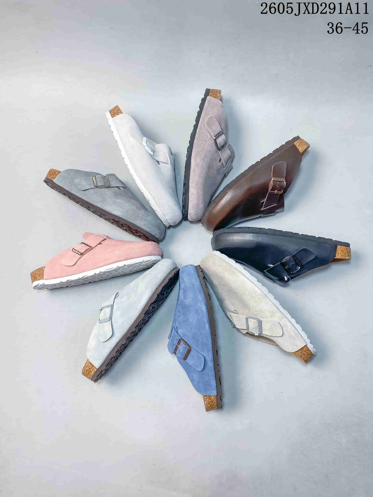 Assortment of Zurich-style clog sandals in multiple colors, including gray, white, mauve, brown, navy, pink and blue