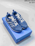 Blue adidas Adizero PR SFTM sneakers with white laces displayed on a blue box.