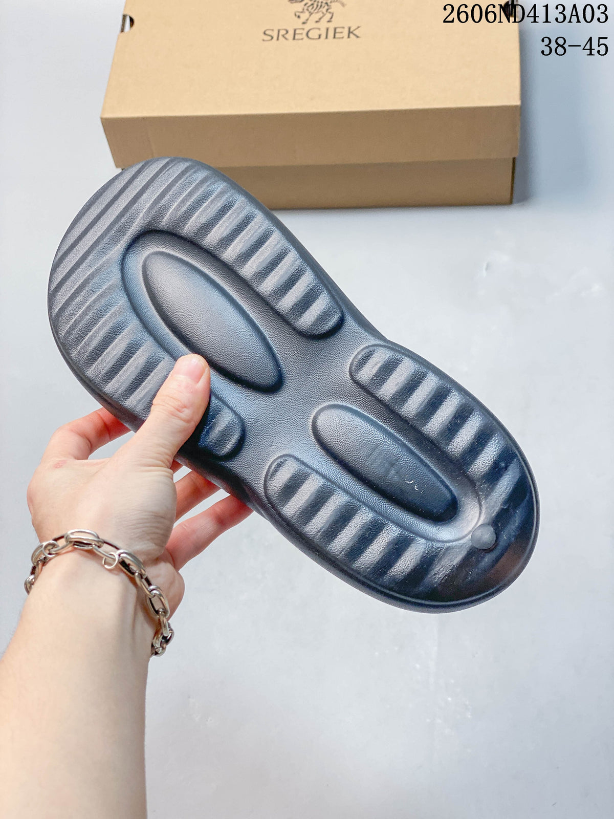 Underside of the sandal showing its molded outsole.