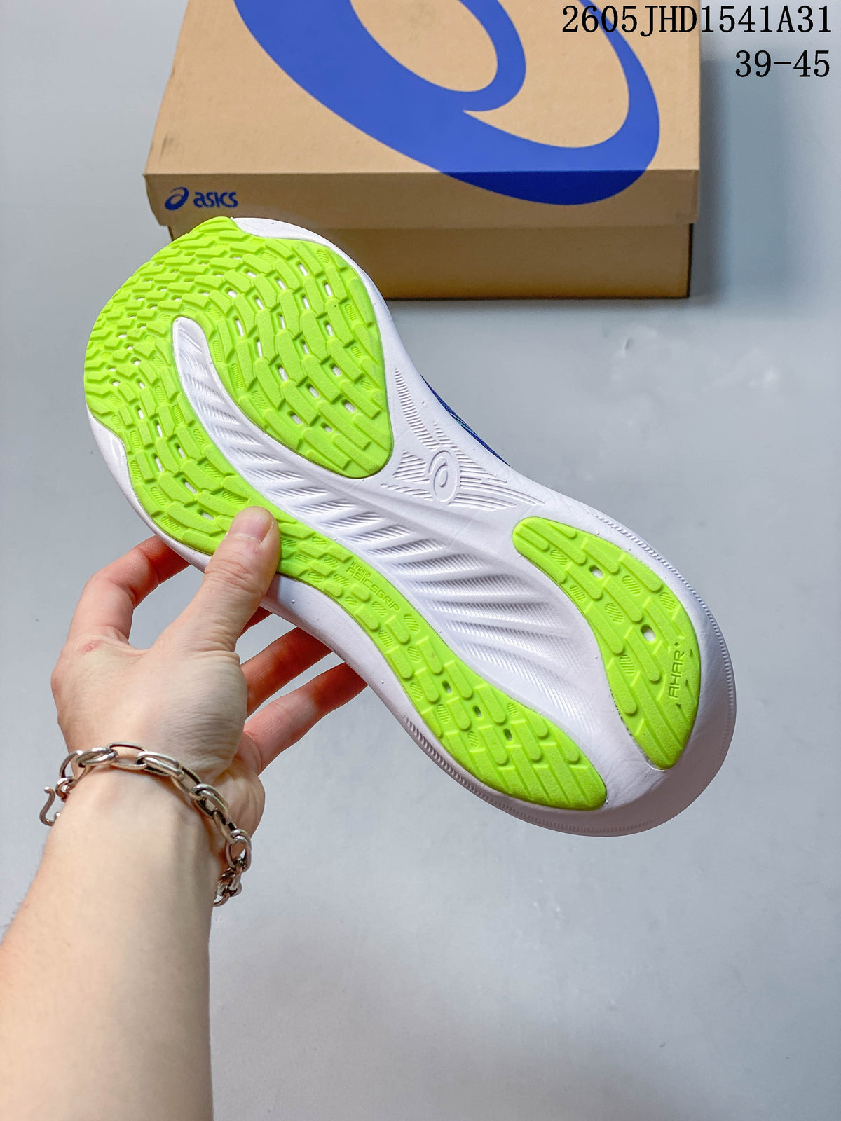 Outsole view showing lime tread and a white midsole on a blue running shoe