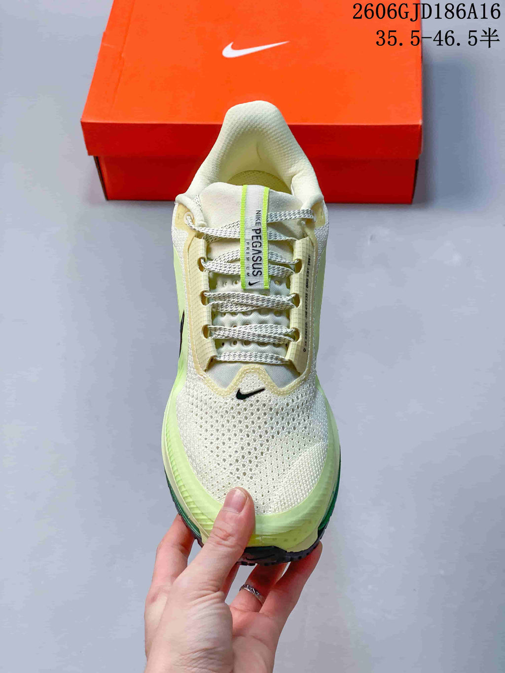 Top view of the Nike Pegasus Premium sneaker with mesh-like upper and lace-up closure