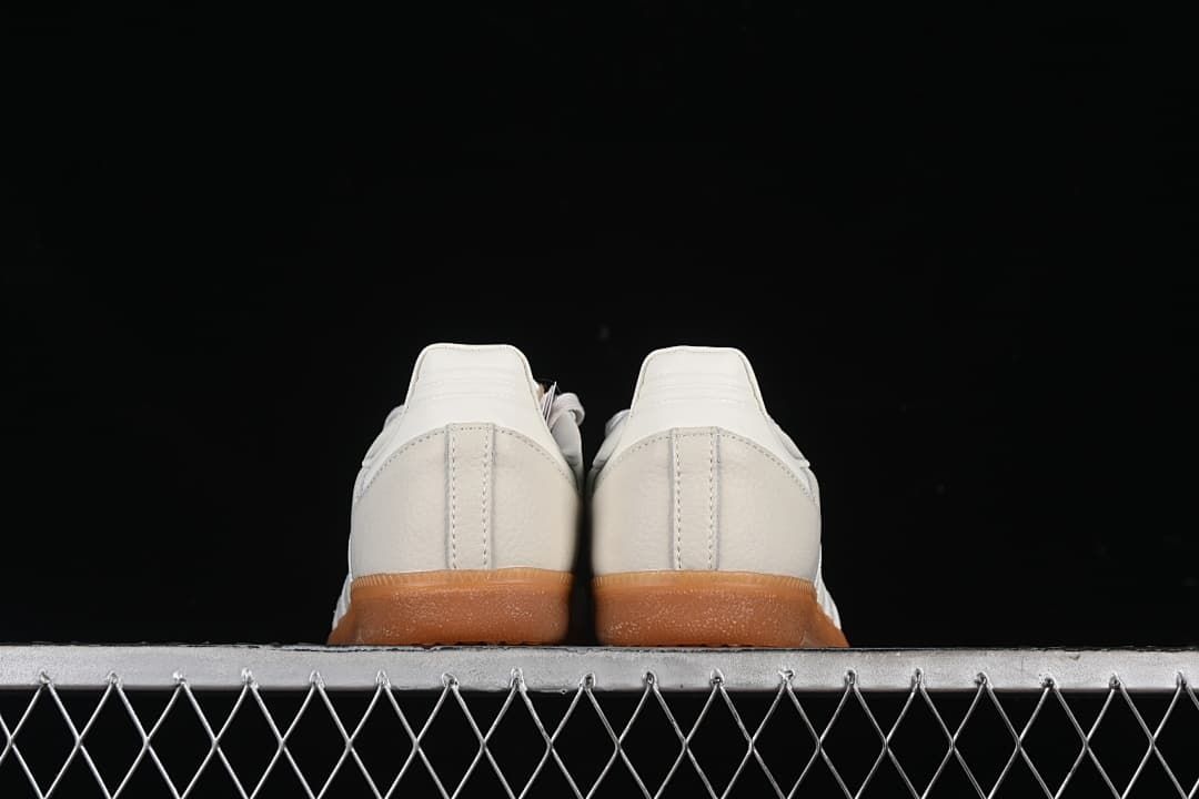 Rear view of the pair showing the heel panels and gum soles