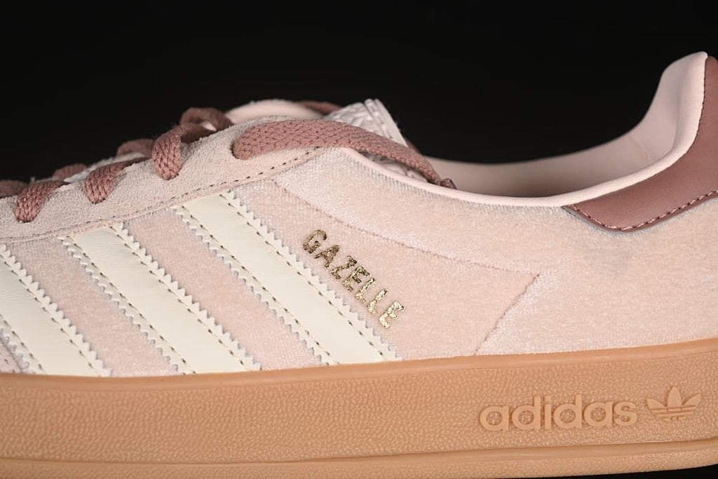 Close-up of Gazelle side lettering, cream stripes and gum-colored sole