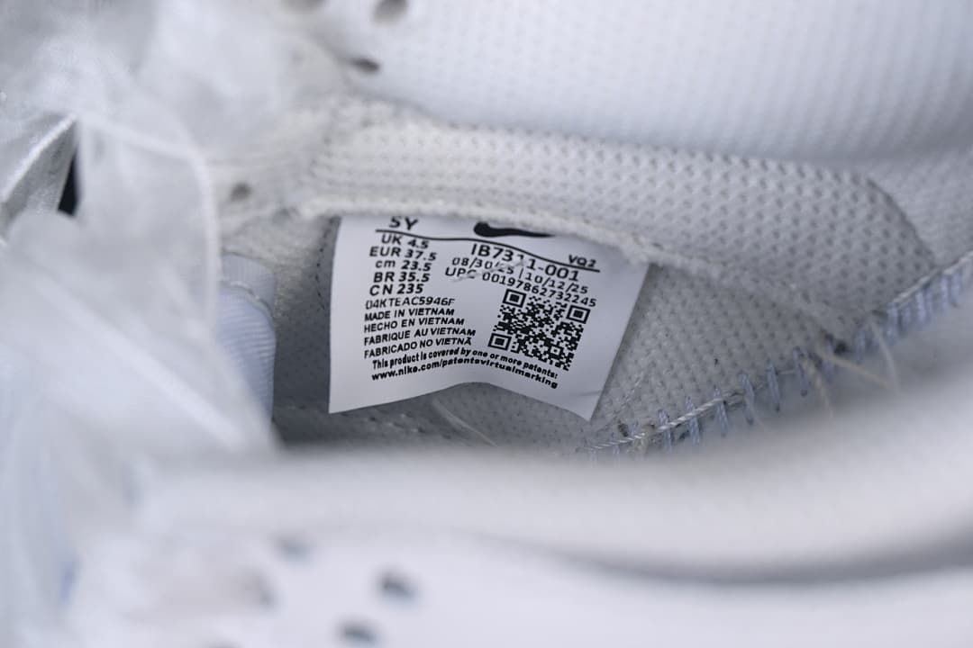 Interior size label showing sample size EU 37.5 and style code IB7311-001