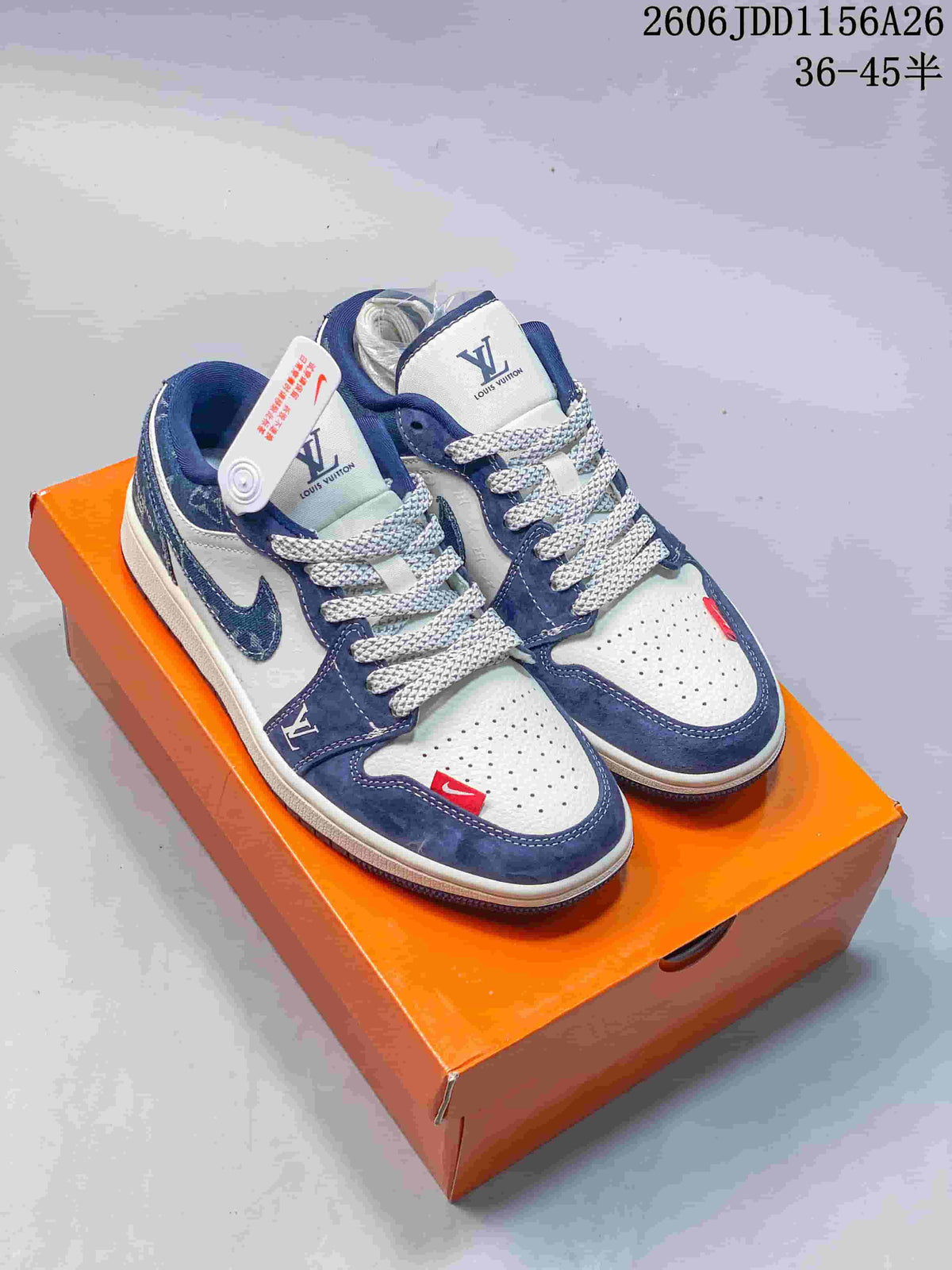 Pair of low-top sneakers with blue patterned overlays and white perforated toe panels.