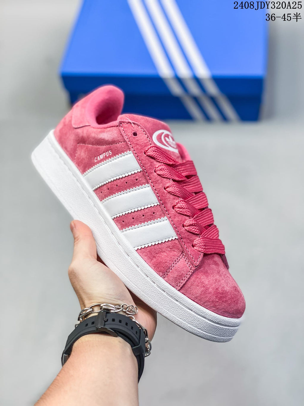 Angled side view of a pink Campus low-top sneaker with white stripes and a white sole.