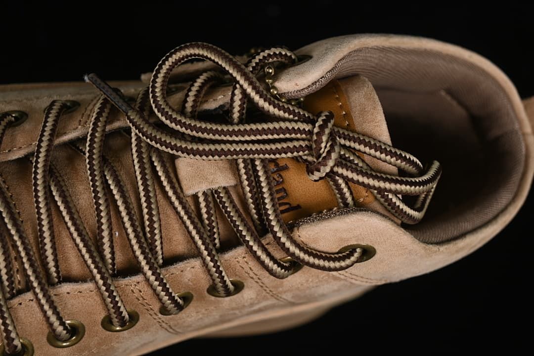 Top view of the boot's tongue, collar, and laces