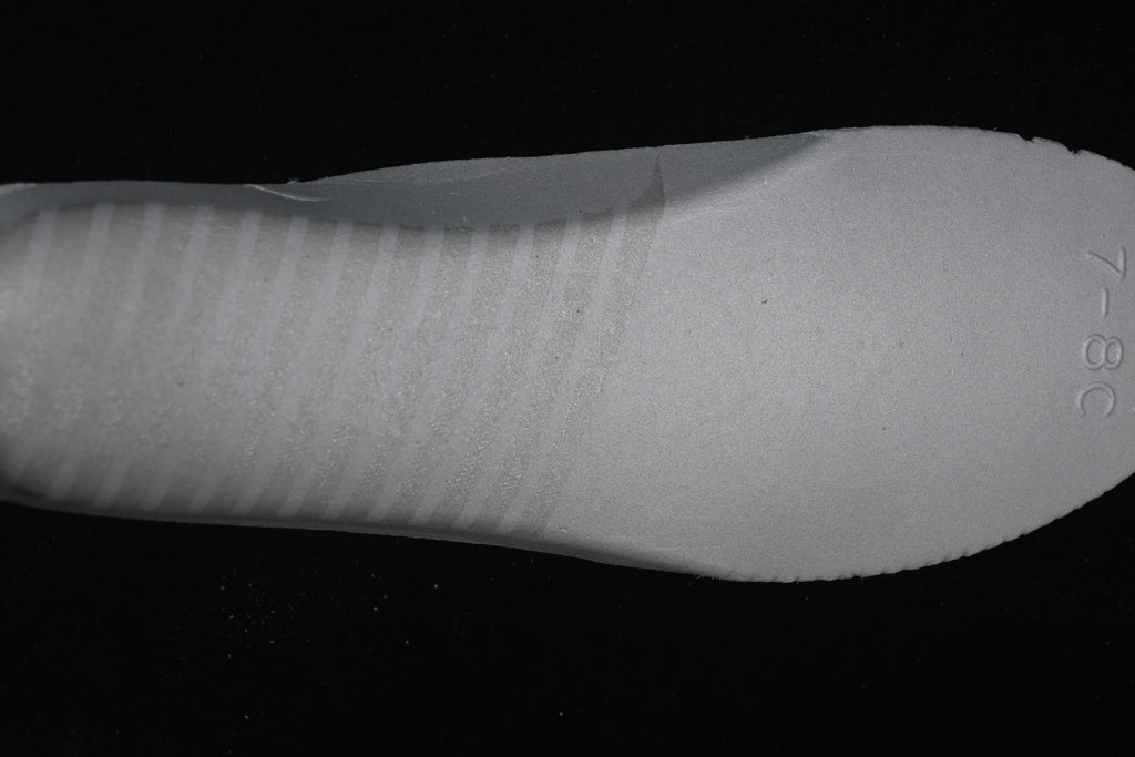 Close-up of the light-colored insole surface