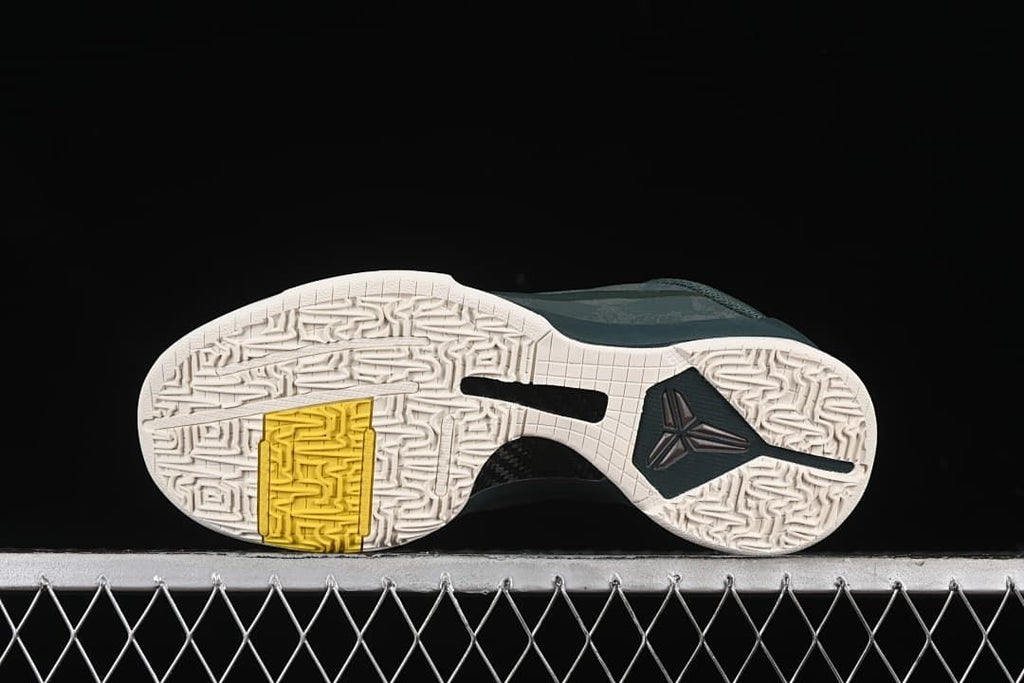 Full outsole view showing patterned tread and colored sections
