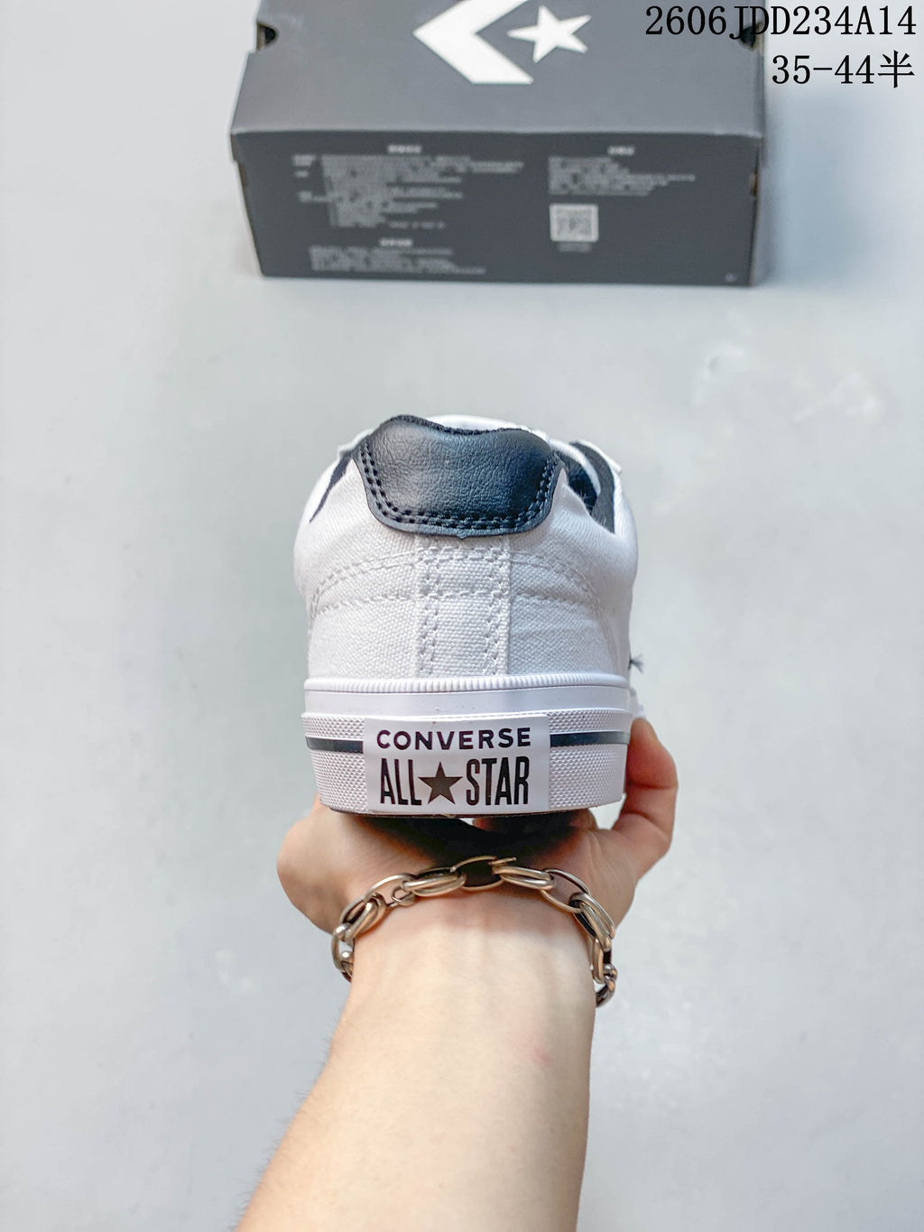 Rear view showing Converse All Star heel branding