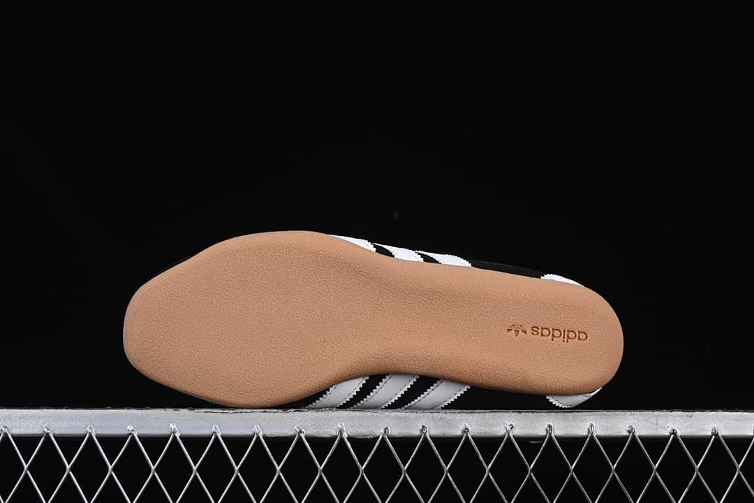 Underside view of the gum-colored sneaker sole