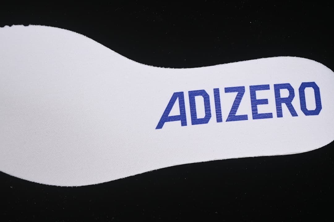 Close-up of Adizero text on the white insole.