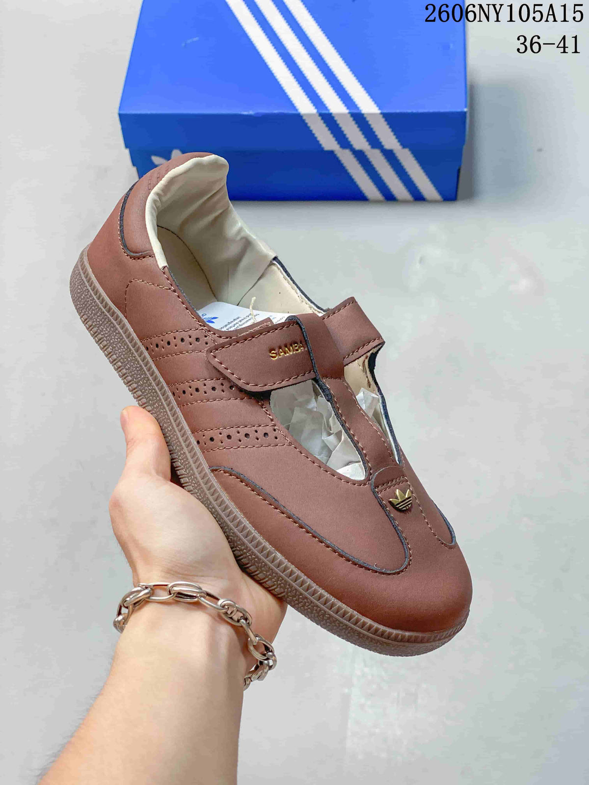 Angled view showing the adjustable strap, perforated side panels, and gum-colored outsole