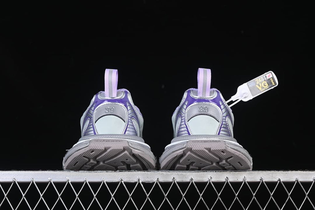 Rear view of the pair showing heel details and outsole tread