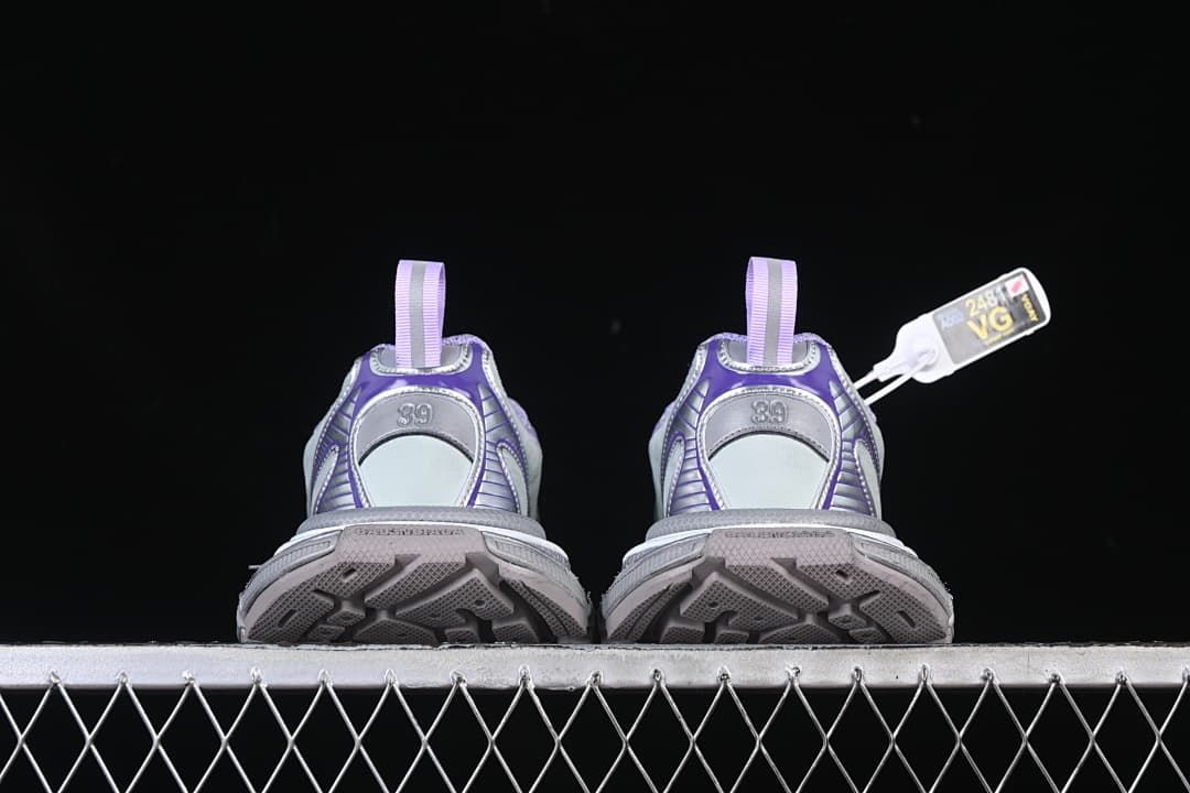 Rear view of the pair showing heel details and outsole tread