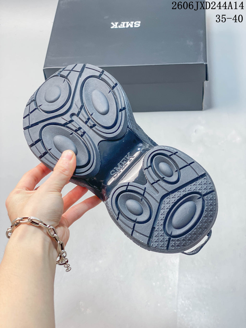 Close-up of the sneakers' outsole with circular tread details