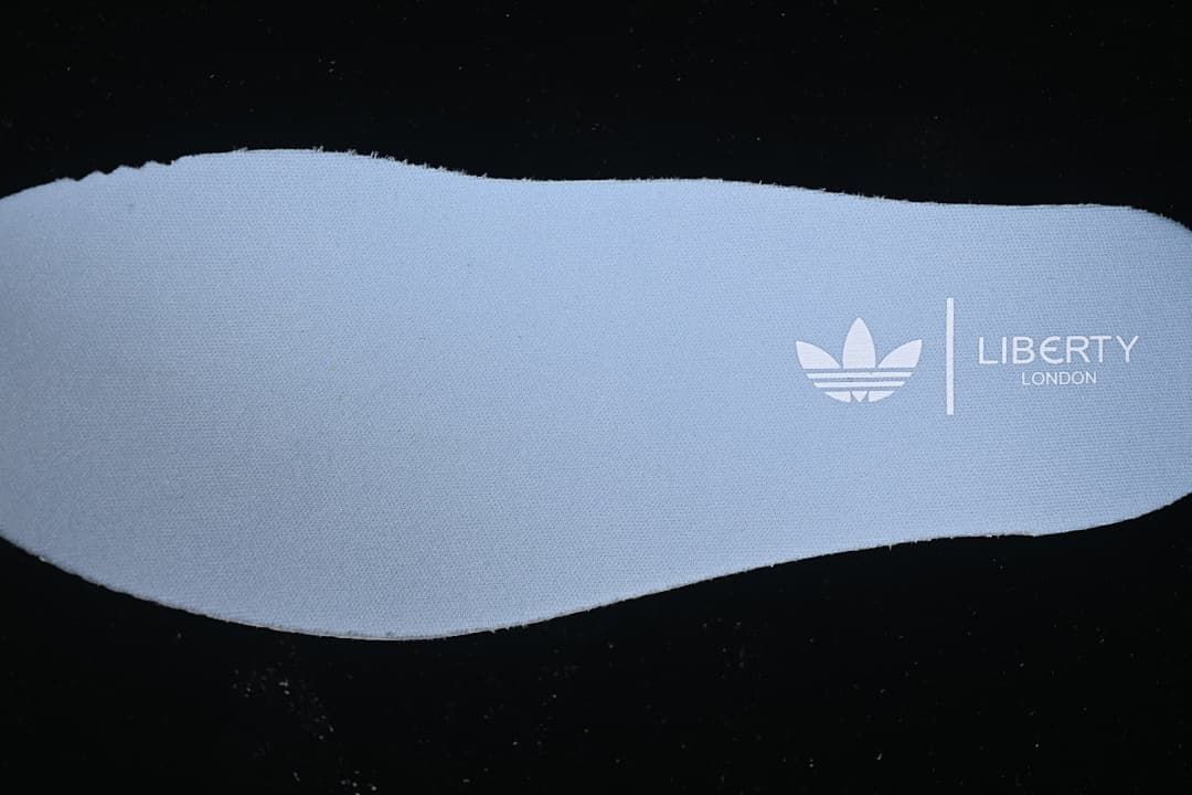 Light blue insert marked Liberty London and adidas Trefoil