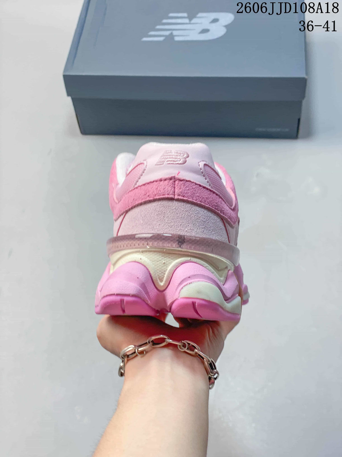 Rear view of a pink sneaker with a sculpted sole